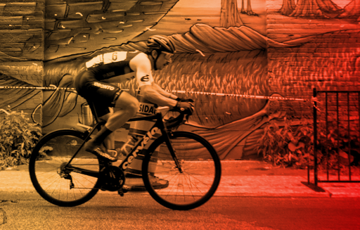 Yuri Cycling with graffiti background